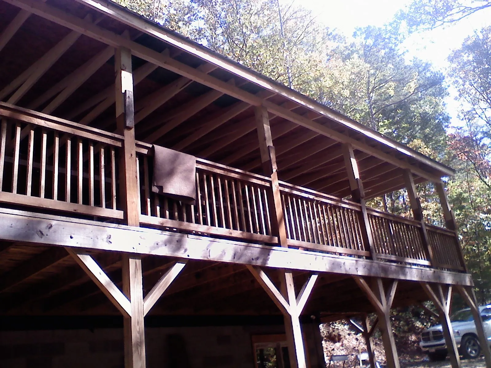 Timber framing under a new elevated porch and deck — Roof Leak Repair in Valatie by Roofing Brothers